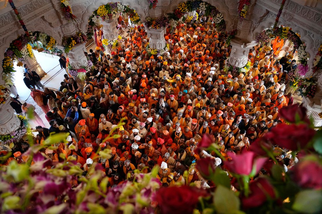 Hindu holy men throng to get the first look of the temple dedicated to Hinduism's Lord Ram soon after its inauguration in Ayodhya, India, Monday, January 22, 2024.