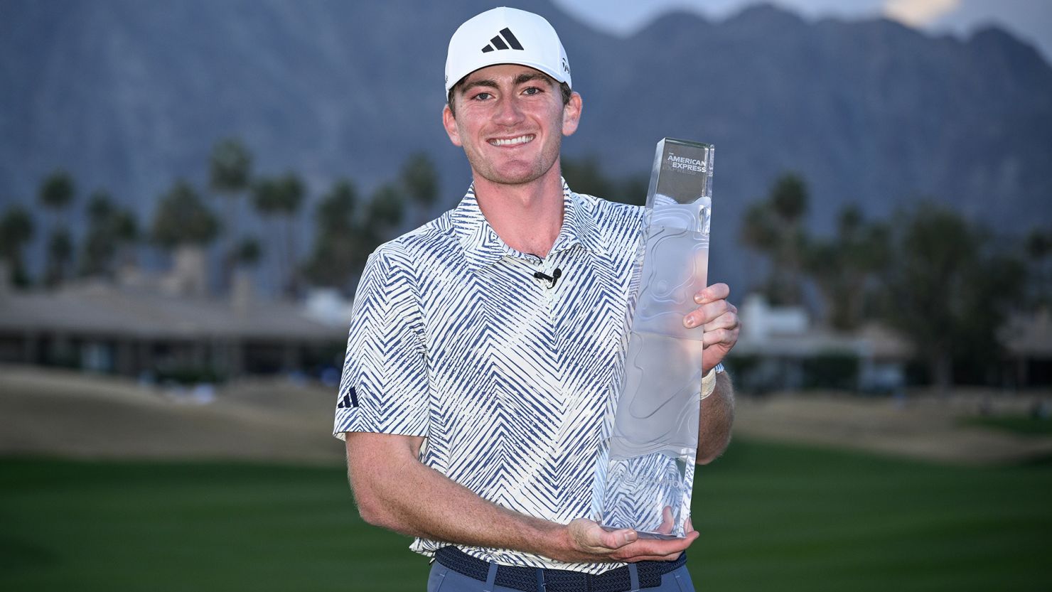 LA QUINTA, CALIFORNIA - JANUARY 21: Nick Dunlap of the United States poses for a photo with the trophy after winning The American Express at Pete Dye Stadium Course on January 21, 2024 in La Quinta, California. (Photo by Orlando Ramirez/Getty Images)