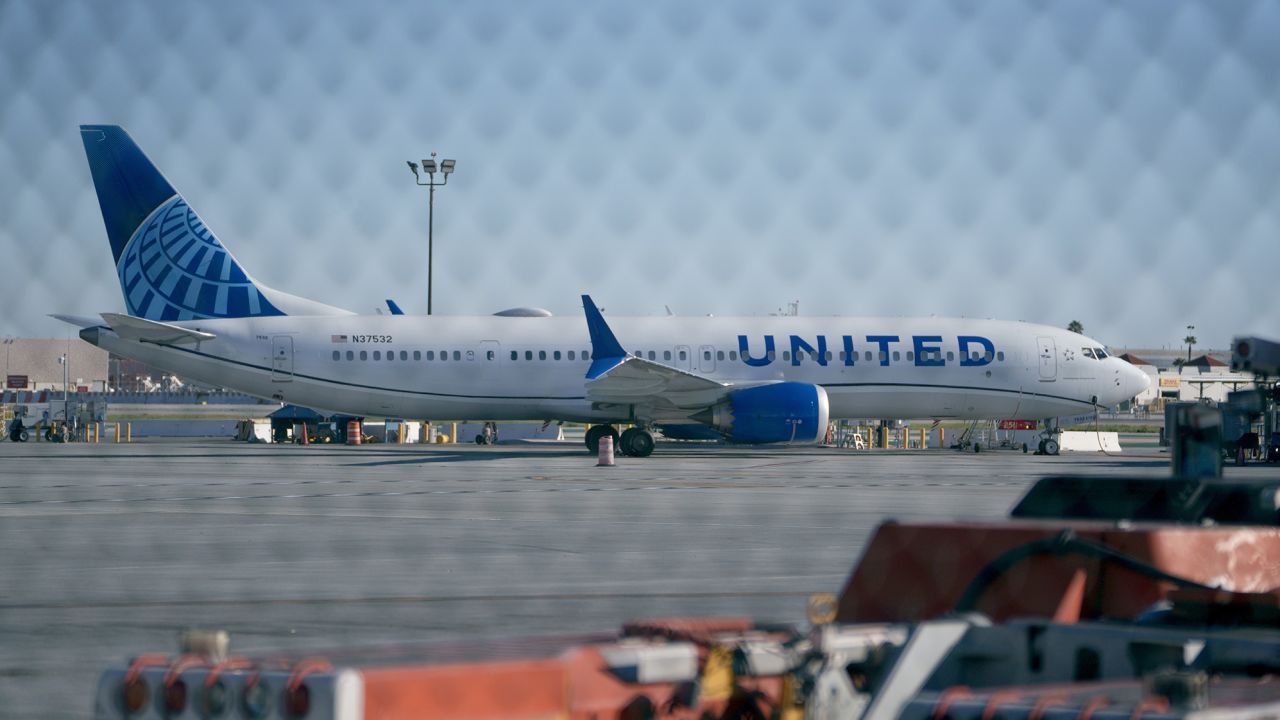 A United Airlines Boeing 737 Max-9 aircraft grounded at Los Angeles International Airport (LAX) in Los Angeles, California, US, on Monday, Jan. 8, 2024. Boeing Co. took the first step toward returning its grounded 737 Max 9 jetliners to service, issuing guidance to airlines on the inspections required following a mid-air structural failure late last week. Photographer: Eric Thayer/Bloomberg via Getty Images