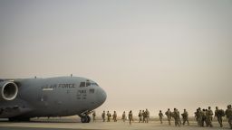 This image taken by the U.S. Air Force shows U.S. Army troops from the 1st Combined Arms Battalion, 163rd Cavalry Regiment, board a C-17 Globemaster III during an exercise at Ali Al Salem Air Base, Kuwait, Aug. 10, 2022. The U.S. Air Force said Saturday, Aug. 20, it was the subject of a "propaganda attack" by a previously unheard-of Iraqi militant group that falsely claimed it had launched a drone attack targeting American troops at an air base in Kuwait. (Staff Sgt. Dalton Willians/U.S. Air Force, via AP)