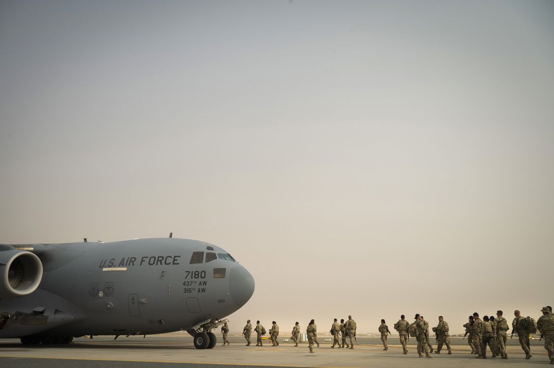 This image taken by the U.S. Air Force shows U.S. Army troops from the 1st Combined Arms Battalion, 163rd Cavalry Regiment, board a C-17 Globemaster III during an exercise at Ali Al Salem Air Base, Kuwait, Aug. 10, 2022. The U.S. Air Force said Saturday, Aug. 20, it was the subject of a "propaganda attack" by a previously unheard-of Iraqi militant group that falsely claimed it had launched a drone attack targeting American troops at an air base in Kuwait. (Staff Sgt. Dalton Willians/U.S. Air Force, via AP)