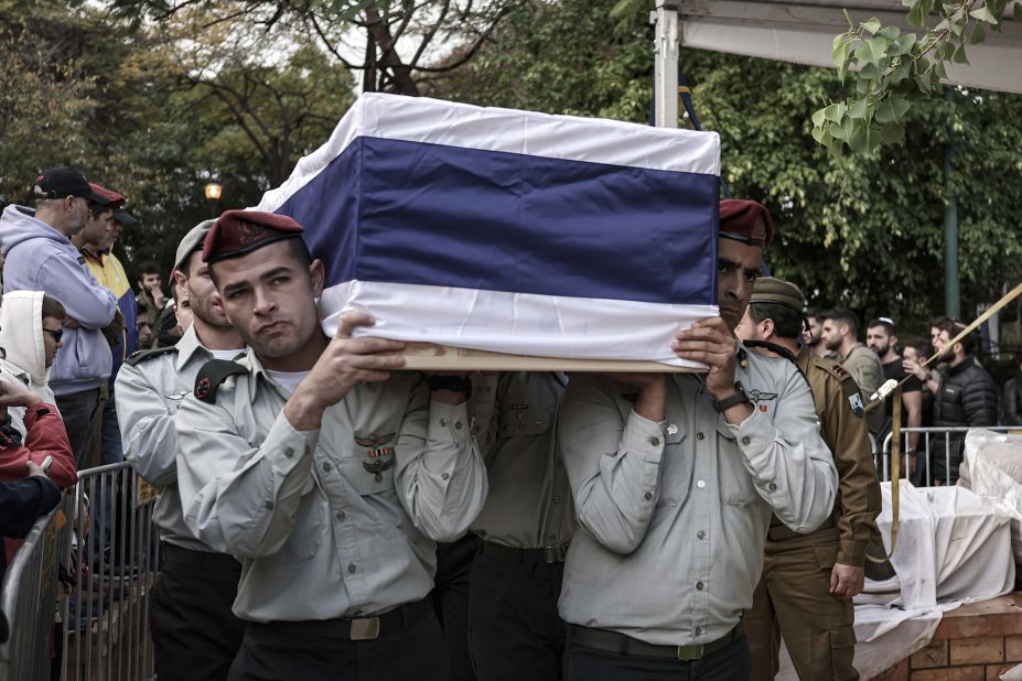 Israeli soldiers hold Major Ilay Levy's coffin during his funeral in Tel Aviv, Israel, on January 23. Levy was one of <a href="https://edition.cnn.com/2024/01/23/middleeast/gaza-israeli-soldiers-deaths-intl-hnk/index.html" target="_blank">24 Israeli soldiers killed on the deadliest day for Israeli forces in Gaza combat.</a>