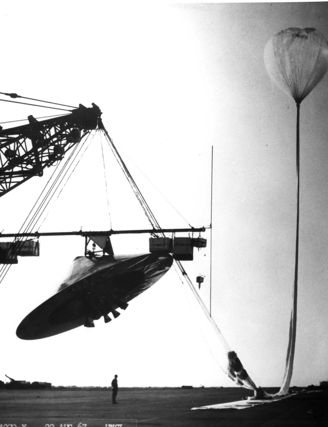 The U.S. Air Force released this photo June 24 of an aeroshell of a NASA Voyager Mars space probe prior to launch at Walker AFB, New Mexico (formerly Roswell AAF) as part of its report on the so called "Roswell Incident" of 1947. The Air Force reported June 24 that "space aliens" who supposedly crashed in the New Mexico desert 50 years ago were only military dummies and that descriptions of research projects involving low altitude tethered objects such as this may have become part of the incident. The 231-page report is aimed at ending longstanding speculation over the incident and denies that the military had recovered bodies from damaged flying saucers in 1947 and had been covering up the incident ever since.