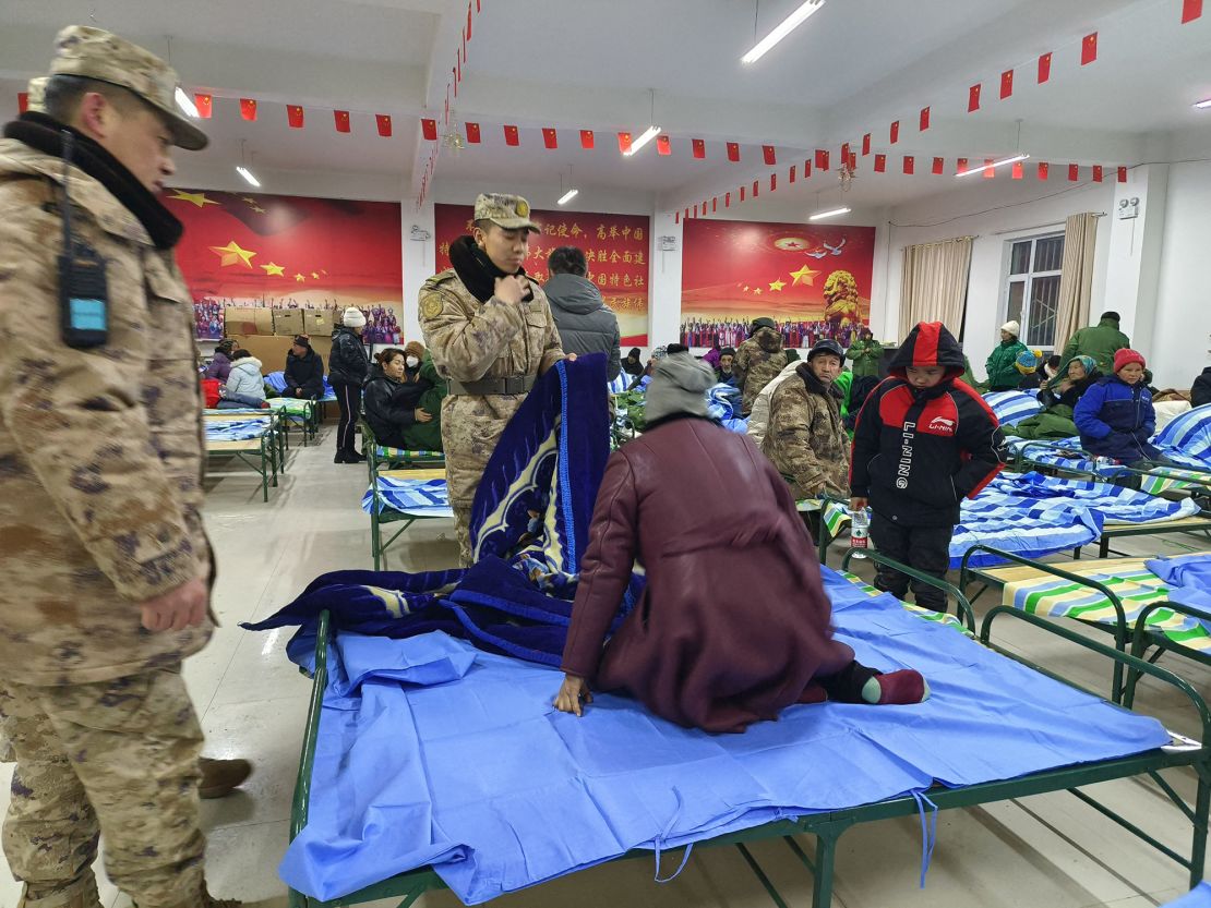 Local residents rest at a temporary shelter after a magnitude 7.1 earthquake strikes Wushi County, Aksu prefecture, in China's northwestern Xinjiang region on January 23, 2024. (Photo by CNS / AFP) / China Out (Photo by STR/CNS/AFP via Getty Images)