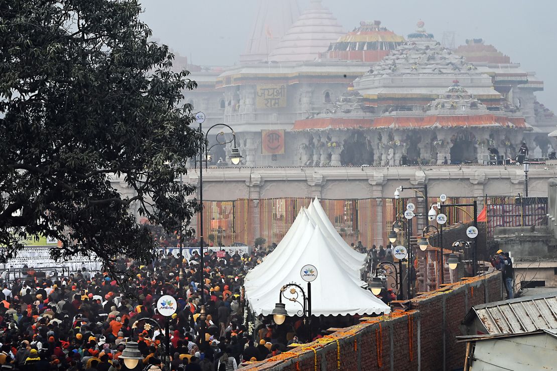 Devotees wait to enter the Ram temple on the first day after its inauguration in Ayodhya, Uttar Pradesh, India, on Tuesday, January 23, 2024.