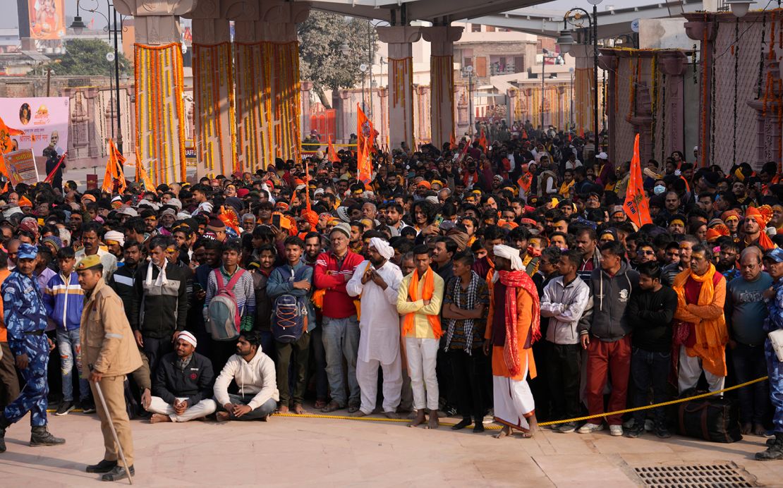Devotees wait in a long queue to enter the newly opened Lord Ram temple, in Ayodhya, India, Tuesday, January 23, 2024.