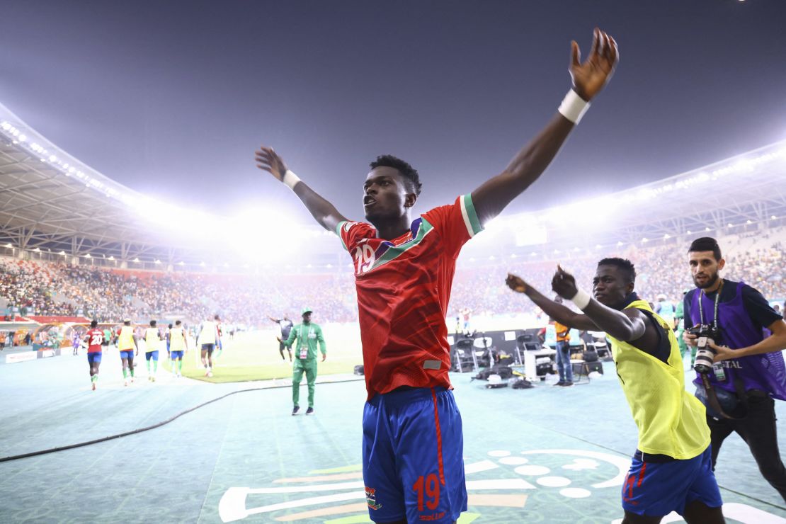 TOPSHOT - Gambia's forward #19 Ebrima Colley celebrates scoring his team's second goal during the Africa Cup of Nations (CAN) 2024 group C football match between Gambia and Cameroon at Stade de la Paix in Bouake on January 23, 2024. (Photo by Kenzo TRIBOUILLARD / AFP) (Photo by KENZO TRIBOUILLARD/AFP via Getty Images)