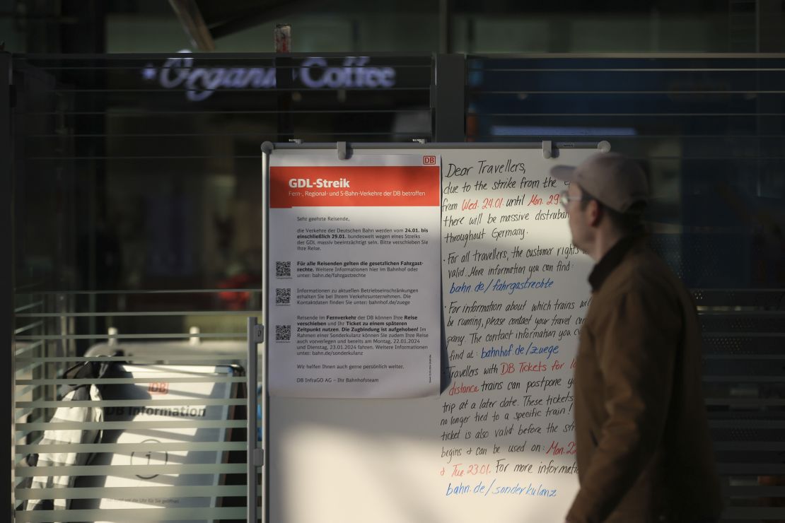 A sign informing travelers of industrial action during a strike by train drivers, at the Central railway station in Berlin, Germany, on Wednesday, Jan. 24, 2024. German rail passengers face six more days of upheaval after a small but influential train drivers' union called on its members to strike for a fourth time in a lingering dispute over pay and working hours. Photographer: Krisztian Bocsi/Bloomberg via Getty Images