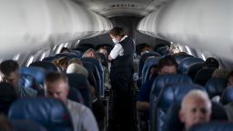 QUEENS, NY - MAY 04:  Passengers and flight attendants aboard a flight from LaGuardia Airport bound for Kansas City International Airport on Wednesday, May 4, 2022 in Queens, NY. (Kent Nishimura / Los Angeles Times via Getty Images)