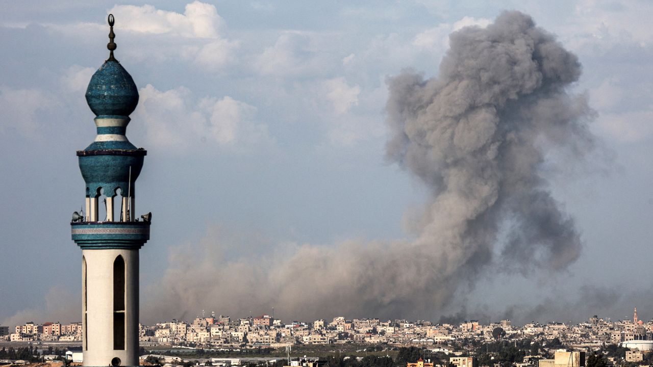 A picture taken from Rafah shows smoke billowing over Khan Yunis in the southern Gaza Strip during Israeli bombardment on January 24, 2024, amid ongoing battles between Israel and the Palestinian militant group Hamas. (Photo by AFP) (Photo by -/AFP via Getty Images)