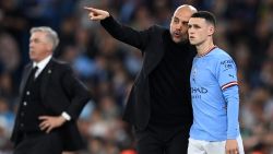 MANCHESTER, ENGLAND - MAY 17: Pep Guardiola gives instructions to Phil Foden of Manchester City during the UEFA Champions League semi-final second leg match between Manchester City FC and Real Madrid at Etihad Stadium on May 17, 2023 in Manchester, England. (Photo by Michael Regan/Getty Images)