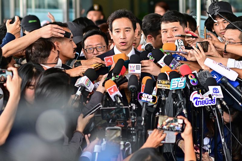 Former Thai prime ministerial candidate and ex-Move Forward Party leader Pita Limjaroenrat (C) speaks to the media outside the Constitutional Court in Bangkok on January 24, 2024, after the court decided to reinstate him as a lawmaker.