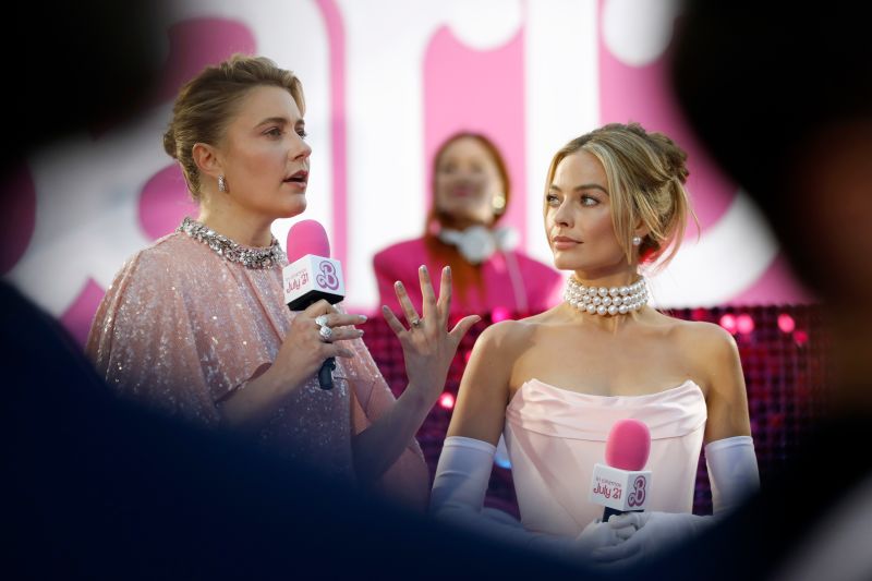 Greta Gerwig and Margot Robbie on stage during the European premiere Of