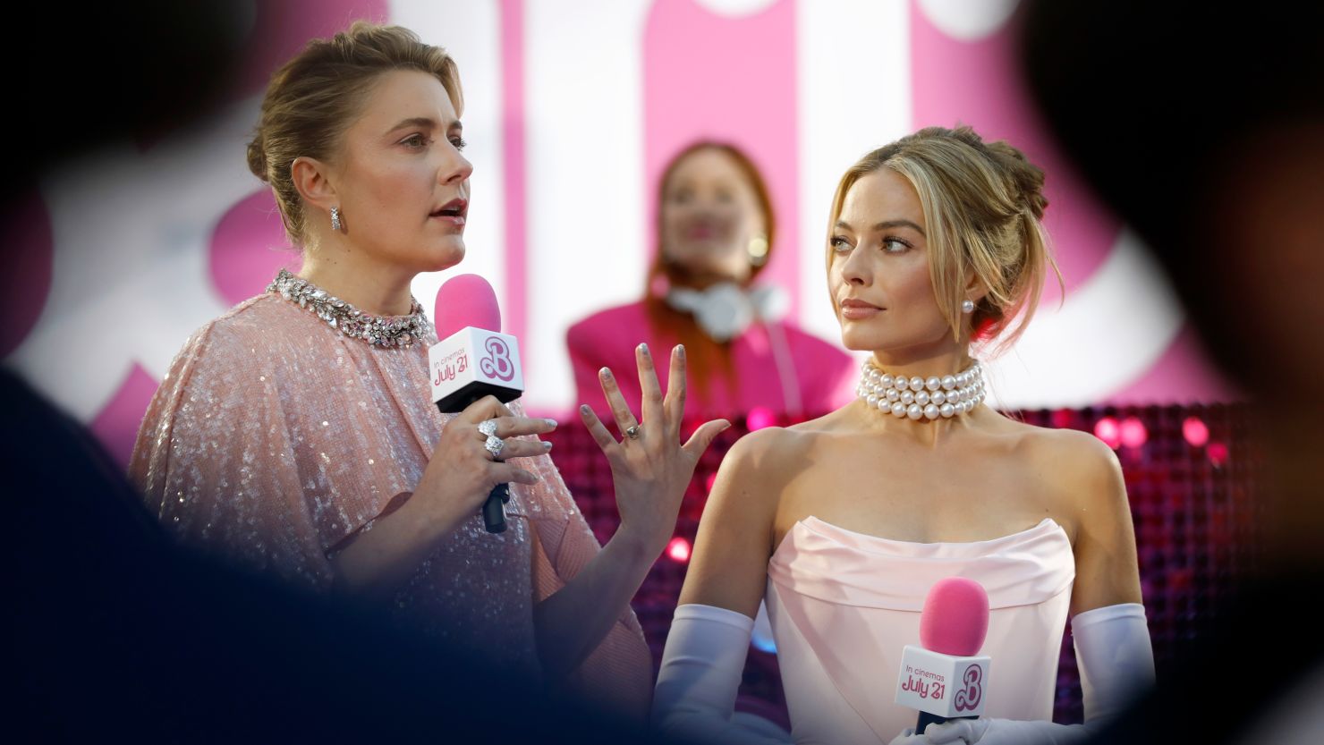 LONDON, ENGLAND - JULY 12: Greta Gerwig and Margot Robbie on stage during The European Premiere Of "Barbie" at Cineworld Leicester Square on July 12, 2023 in London, England. (Photo by Tristan Fewings/Getty Images for Warner Bros.)