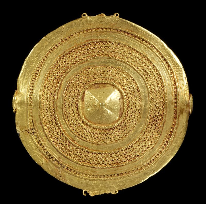 A cast gold badge.