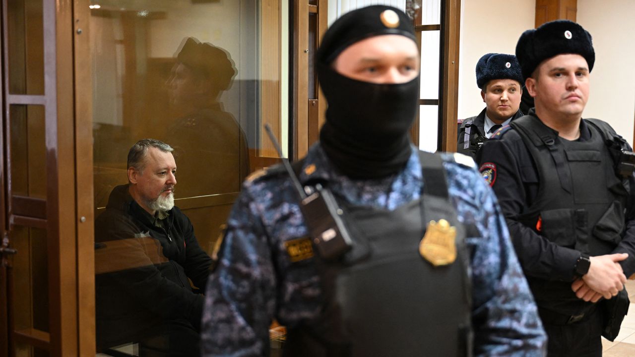 Igor Girkin (Strelkov), the former top military commander of the self-proclaimed "Donetsk People's Republic" and nationalist blogger charged with extremism, sits inside a glass defendants' cage ahead of his verdict hearing at the Moscow City Court in Moscow on January 25, 2024. (Photo by Natalia KOLESNIKOVA / AFP) (Photo by NATALIA KOLESNIKOVA/AFP via Getty Images)