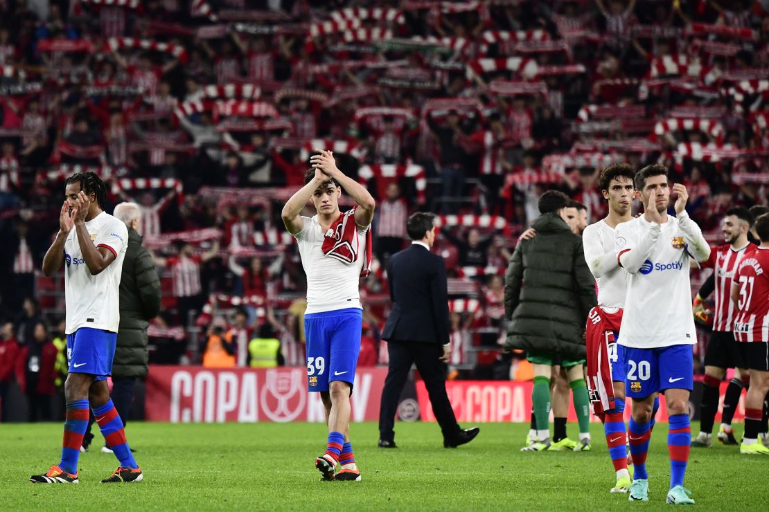 (From L) Barcelona's French defender #23 Jules Kounde, Barcelona's Spanish defender #39 Hector Fort, Barcelona's Portuguese forward #14 Joao Felix and Barcelona's Spanish midfielder #20 Sergi Roberto applaud at the end of the Spanish Copa del Rey (King's Cup) quarter final football match between Athletic Club Bilbao and FC Barcelona at the San Mames stadium in Bilbao on January 24, 2024. (Photo by ANDER GILLENEA / AFP) (Photo by ANDER GILLENEA/AFP via Getty Images)