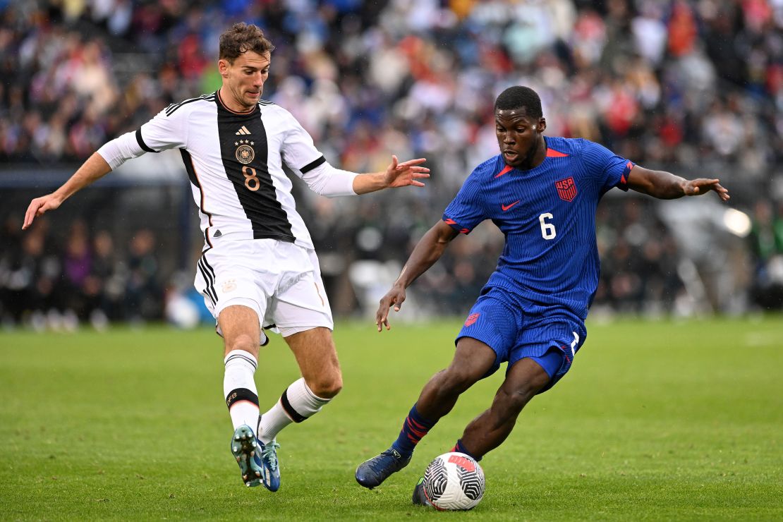 EAST HARTFORD, CONNECTICUT - OCTOBER 14: Yunus Musah #6 of the United States controls the ball against Leon Goretzka #8 of Germany during the second half of an international friendly match at Pratt & Whitney Stadium on October 14, 2023 in East Hartford, Connecticut. (Photo by Mike Lawrence/ISI Photos/USSF/Getty Images for USSF)