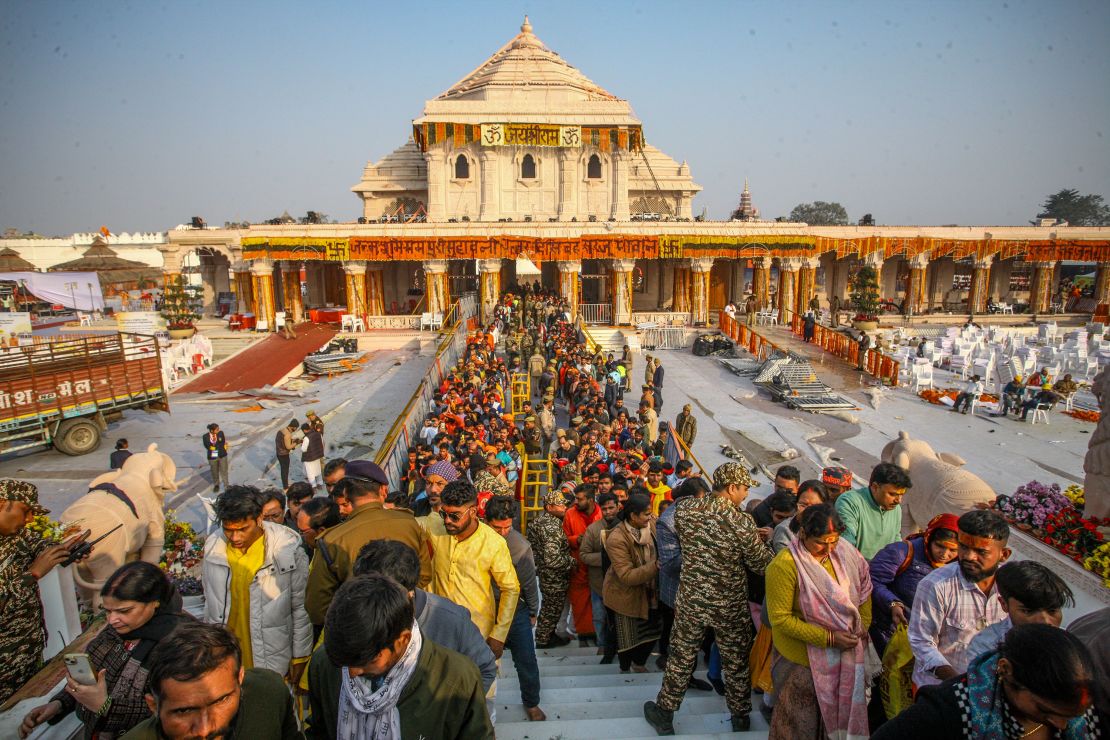 AYODHYA, INDIA - JANUARY 23: Devotees queue to get glimpse of a statue of the hindu god Ram one day after consecration ceremony of the Ram Mandir on January 23, 2024 in Ayodhya, India. The Ram Mandir, a temple built at a site thought to be the birth place of Lord Rama, a significant figure in Hindu religion, was inaugurated on Jan. 22, 2024. (Photo by Ritesh Shukla/Getty Images)