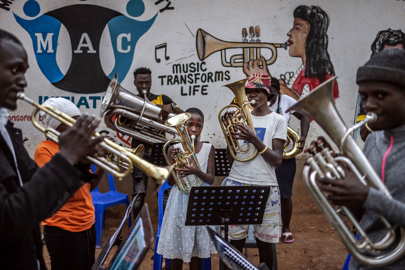 Members of a community brass band rehearse for a performance at the Bwaise informal settlement in Kampala, Uganda, on Tuesday, January 23. Brass for Africa empowers children and young people from disadvantaged backgrounds to positively transform their lives.