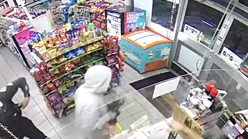 Police officer walks in on an armed robbery in progress. See what happens next