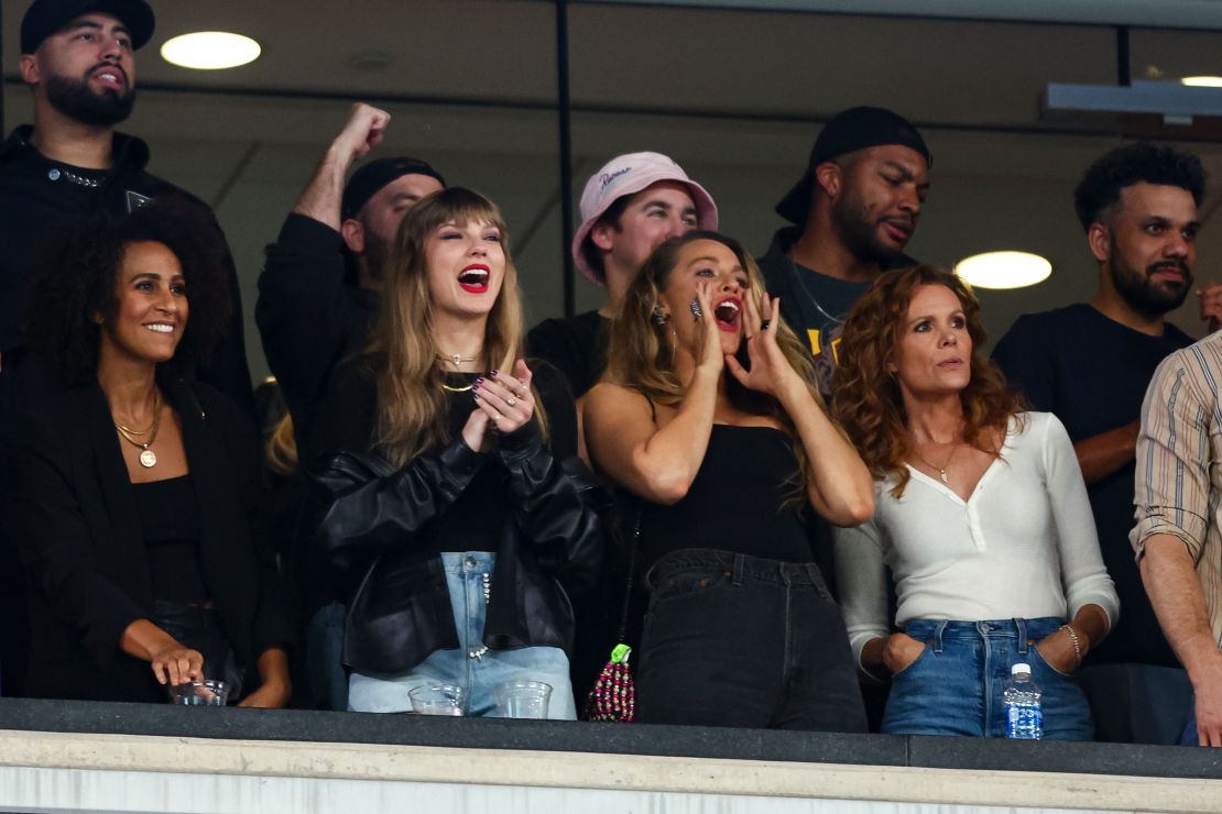 EAST RUTHERFORD, NJ - OCTOBER 1: Taylor Swift and Blake Lively cheer from the stands during an NFL football game between the New York Jets and the Kansas City Chiefs at MetLife Stadium on October 1, 2023 in East Rutherford, New Jersey. (Photo by Kevin Sabitus/Getty Images)