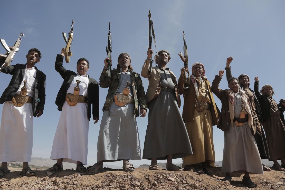 SANAA, YEMEN - JANUARY 22: A view of the Houthi supporters gather while carrying heavy weapons and chant slogans to stage a parade and demonstration against the US and UK attacks while carrying Palestinian flags at the Bani Hushaish area in Sanaa, Yemen on January 22, 2024. (Photo by Mohammed Hamoud/Anadolu via Getty Images)