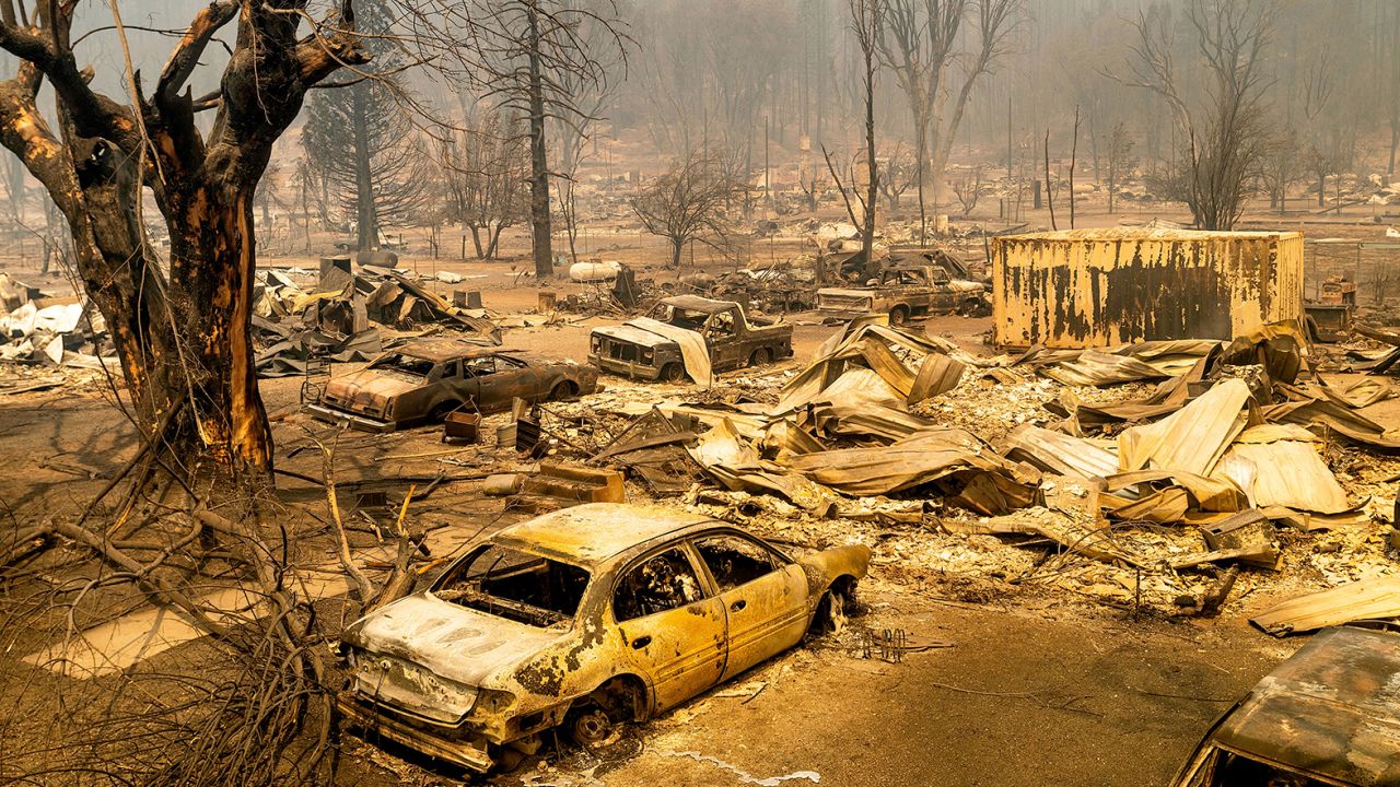 This photo shows cars and homes destroyed by the Dixie Fire line central Greenville on Thursday, Aug. 5, 2021, in Plumas County, Calif.