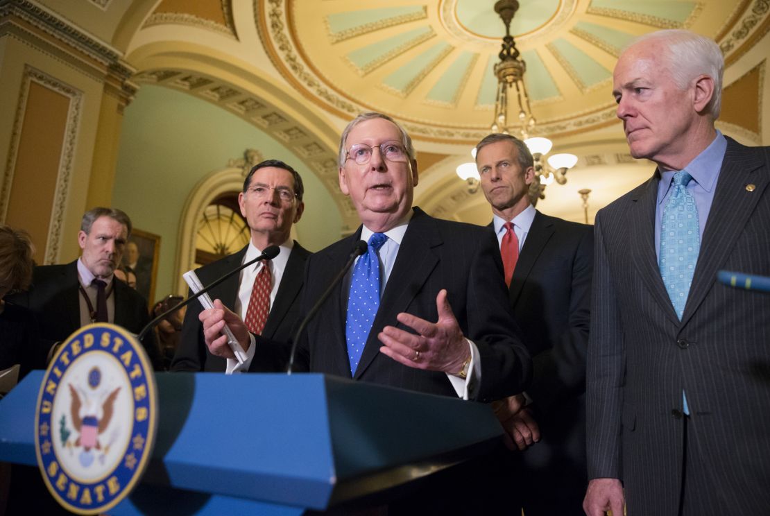 Senate Majority Leader Mitch McConnell of Ky., center, joined by, from left, Sen. John Barrasso, R-Wyo., Sen. John Thune, R-S.D., and Senate Majority Whip John Cornyn of Texas, talks to reporters on Capitol Hill in Washington, Tuesday, March 1, 2016, following a closed-door policy meeting. Earlier, McConnell, Senate Minority Leader Harry Reid of Nev., and senior members of the Judiciary Committee met with President Barack Obama to discuss the impasse over filling the vacancy on the Supreme Court.  (AP Photo/J. Scott Applewhite)