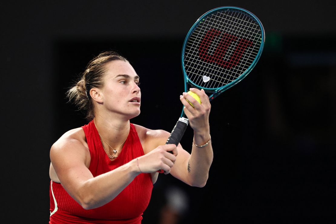 Belarus' Aryna Sabalenka serves against China's Zheng Qinwen during their women's singles final match on day 14 of the Australian Open tennis tournament in Melbourne on January 27, 2024. (Photo by David GRAY / AFP) / -- IMAGE RESTRICTED TO EDITORIAL USE - STRICTLY NO COMMERCIAL USE -- (Photo by DAVID GRAY/AFP via Getty Images)