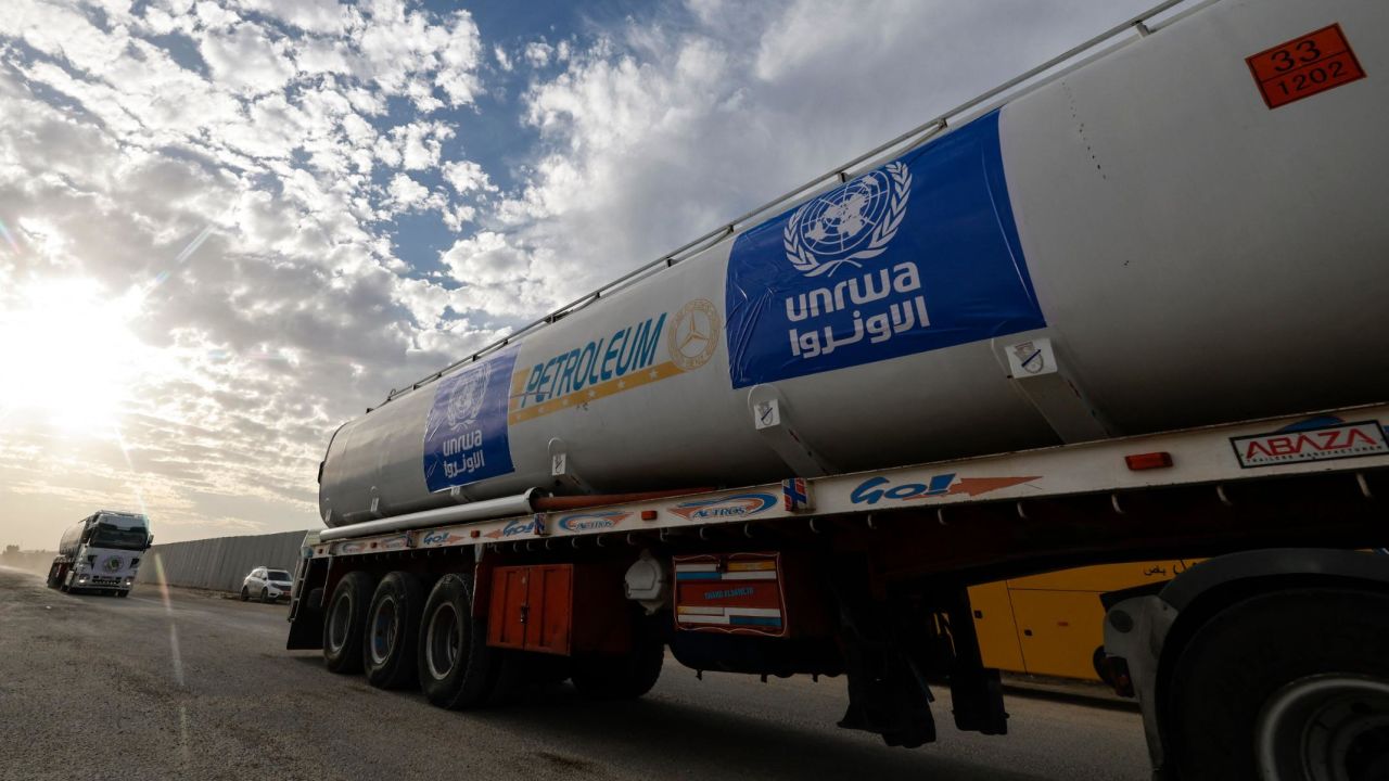 Trucks of the United Nations Relief and Works Agency for Palestine Refugees (UNRWA) carrying fuel arrive at the Egyptian side of the Rafah border crossing with the Gaza Strip on November 22, 2023, amid ongoing battles between Israel and the Palestinian militant group Hamas.