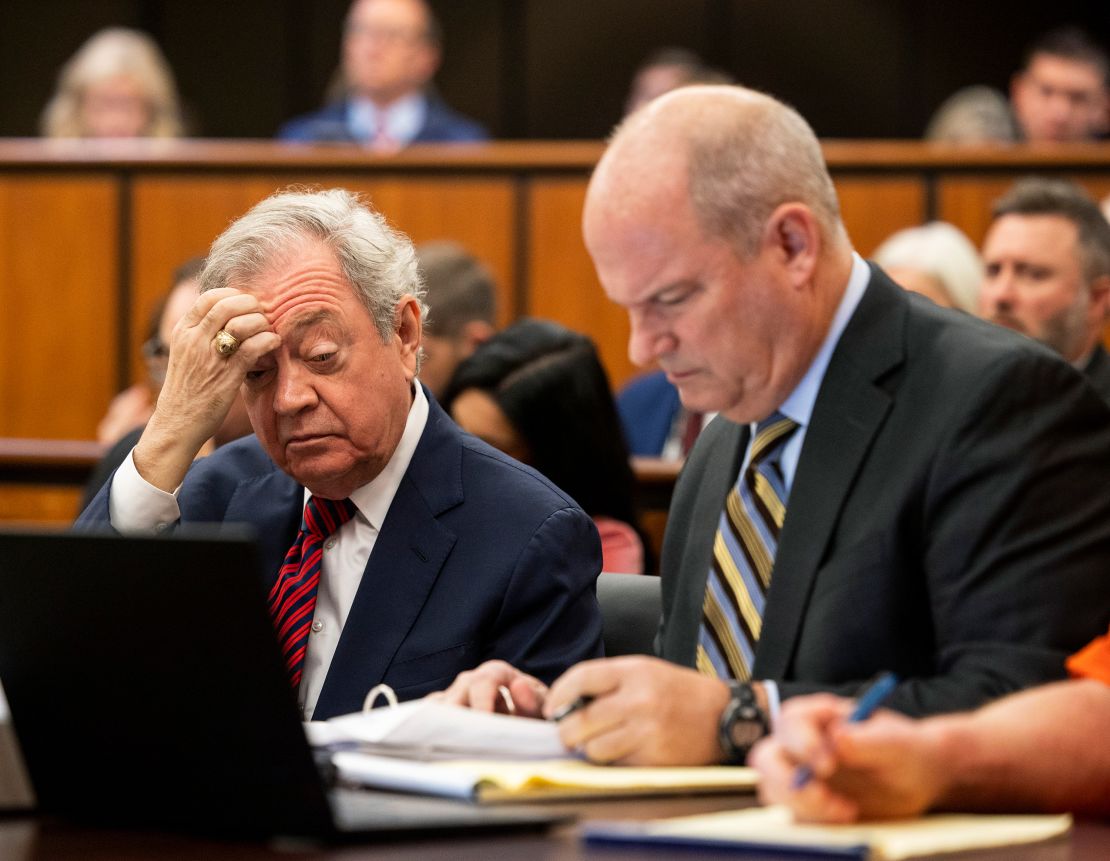 Alex Murdaugh's defense attorneys Dick Harpootlian, left, and Jim Griffin look over materials before a hearing on the motion for a retrial, Tuesday, Jan. 16, 2024, at the Richland County Judicial Center, in Columbia, S.C. Murdaugh was convicted of killing his wife, Maggie, and younger son, Paul, in June 2021.