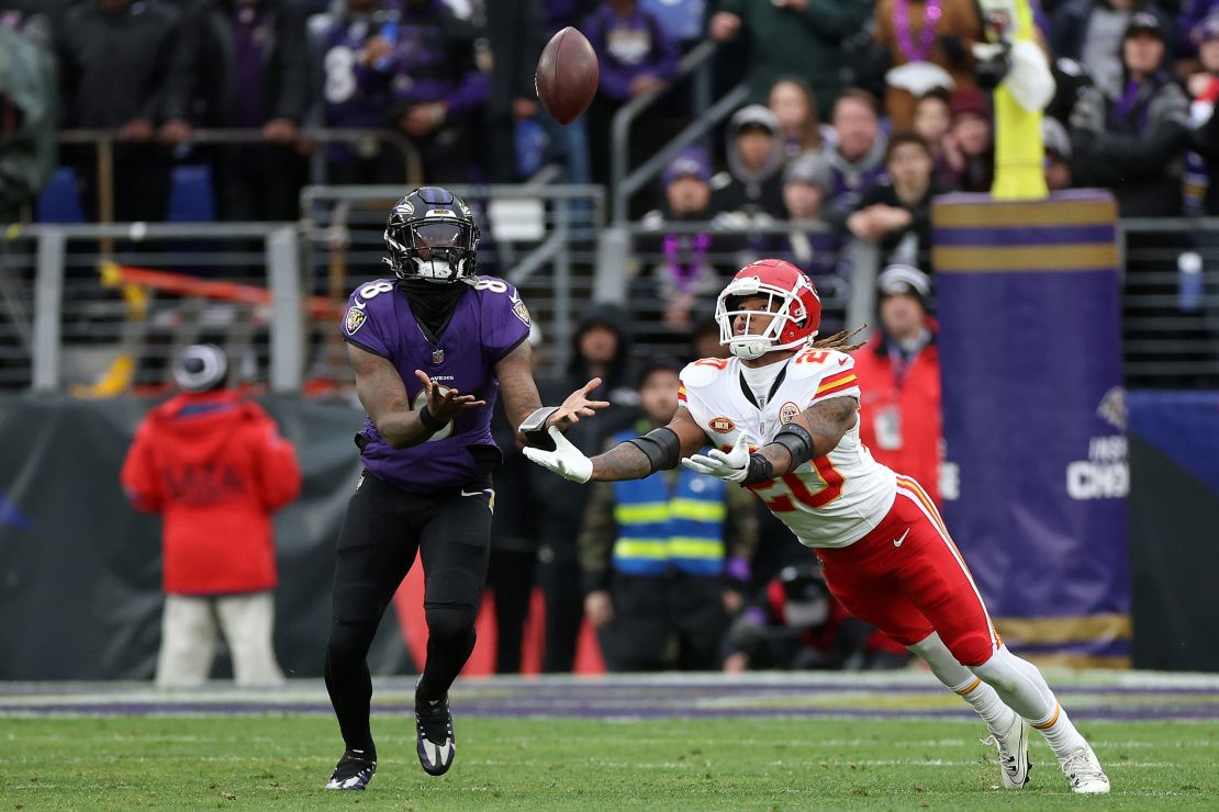 BALTIMORE, MARYLAND - JANUARY 28: Lamar Jackson #8 of the Baltimore Ravens catches his own pass after it was tipped during the second quarter against the Kansas City Chiefs in the AFC Championship Game at M&T Bank Stadium on January 28, 2024 in Baltimore, Maryland. (Photo by Rob Carr/Getty Images)
