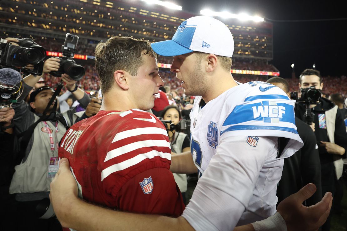 SANTA CLARA, CALIFORNIA - JANUARY 28: Brock Purdy #13 of the San Francisco 49ers shakes hands with Jared Goff #16 of the Detroit Lions following the NFC Championship Game at Levi's Stadium on January 28, 2024 in Santa Clara, California. San Francisco defeated Detroit 34-31. (Photo by Ezra Shaw/Getty Images)