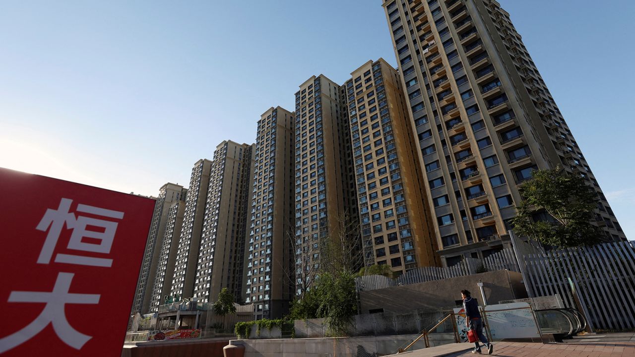 An Evergrande sign is seen near residential buildings at an Evergrande c, China September 27, 2023. 