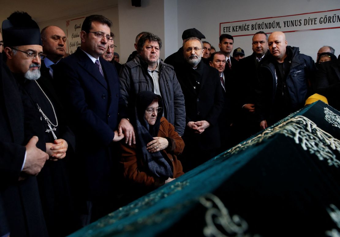 Vicar Apostolic of Istanbul Massimiliano Palinuro and Istanbul Mayor Ekrem Imamoglu attend a funeral ceremony for the church shooting victim Tuncer Murat Cihan at Nurtepe Cemevi in Istanbul, Turkey January 29, 2024. REUTERS/Dilara Senkaya