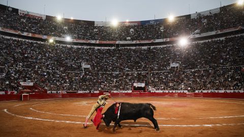 TOPSHOT - Mexican bullfighter Joselito Adame kills a bull during a bullfight event at the Monumental Plaza de Toros Mexico in Mexico City on January 28, 2024. Bullfighting resumed on Sunday in Mexico City after the Supreme Court revoked an earlier suspension. (Photo by Rodrigo Oropeza / AFP) (Photo by RODRIGO OROPEZA/AFP via Getty Images)