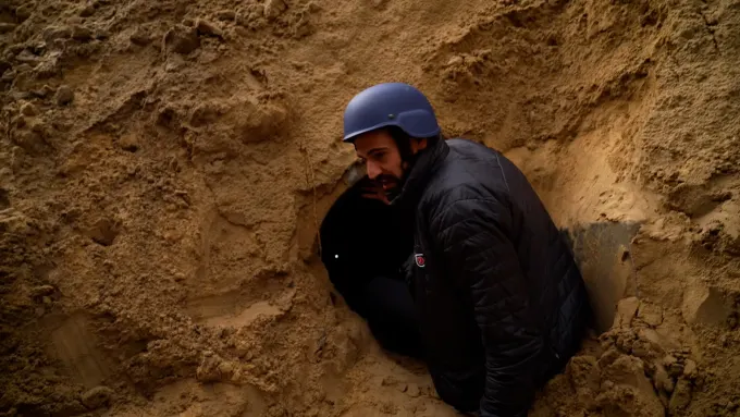 card Video — Claims a tunnel ran through this Gaza cemetery it destroyed. CNN's embedded journalists saw no evidence; the site raised more questions than answers