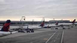 Grounded Delta Airlines planes are parked at gates at John F. Kennedy International Airport on January 11, 2023, in New York.