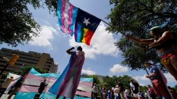 FILE - Demonstrators gather on the steps to the Texas Capitol to speak against transgender-related legislation bills being considered in the Texas Senate and House, May 20, 2021, in Austin, Texas. The Texas Supreme Court will allow the new state law banning gender-affirming care for minors to take effect on Friday, Sept. 1, 2023, setting up Texas to be the most populous state with such restrictions on transgender children. (AP Photo/Eric Gay, File)