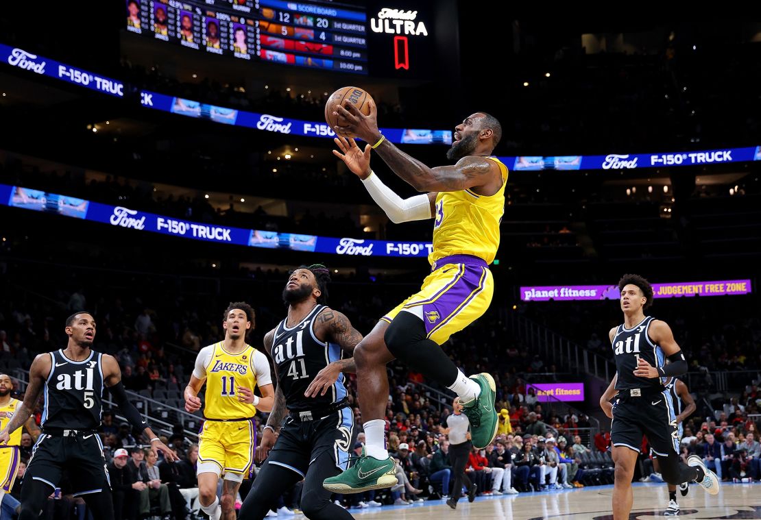 ATLANTA, GEORGIA - JANUARY 30:  LeBron James #23 of the Los Angeles Lakers drives against Saddiq Bey #41 of the Atlanta Hawks during the first quarter at State Farm Arena on January 30, 2024 in Atlanta, Georgia.  NOTE TO USER: User expressly acknowledges and agrees that, by downloading and/or using this photograph, user is consenting to the terms and conditions of the Getty Images License Agreement.  (Photo by Kevin C. Cox/Getty Images). (Photo by Kevin C. Cox/Getty Images)