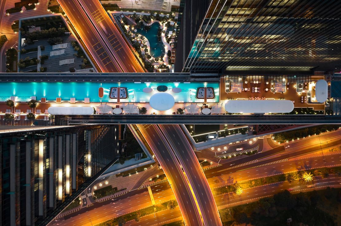 The pool is 100 meters off the ground — with nothing but a six-lane highway below.