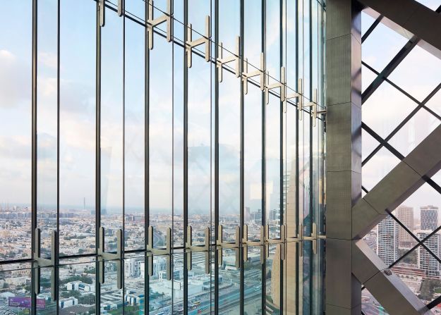 The Link's 100-meter elevation and floor-to-ceiling windows provide 360-degree views across the city to the desert beyond.