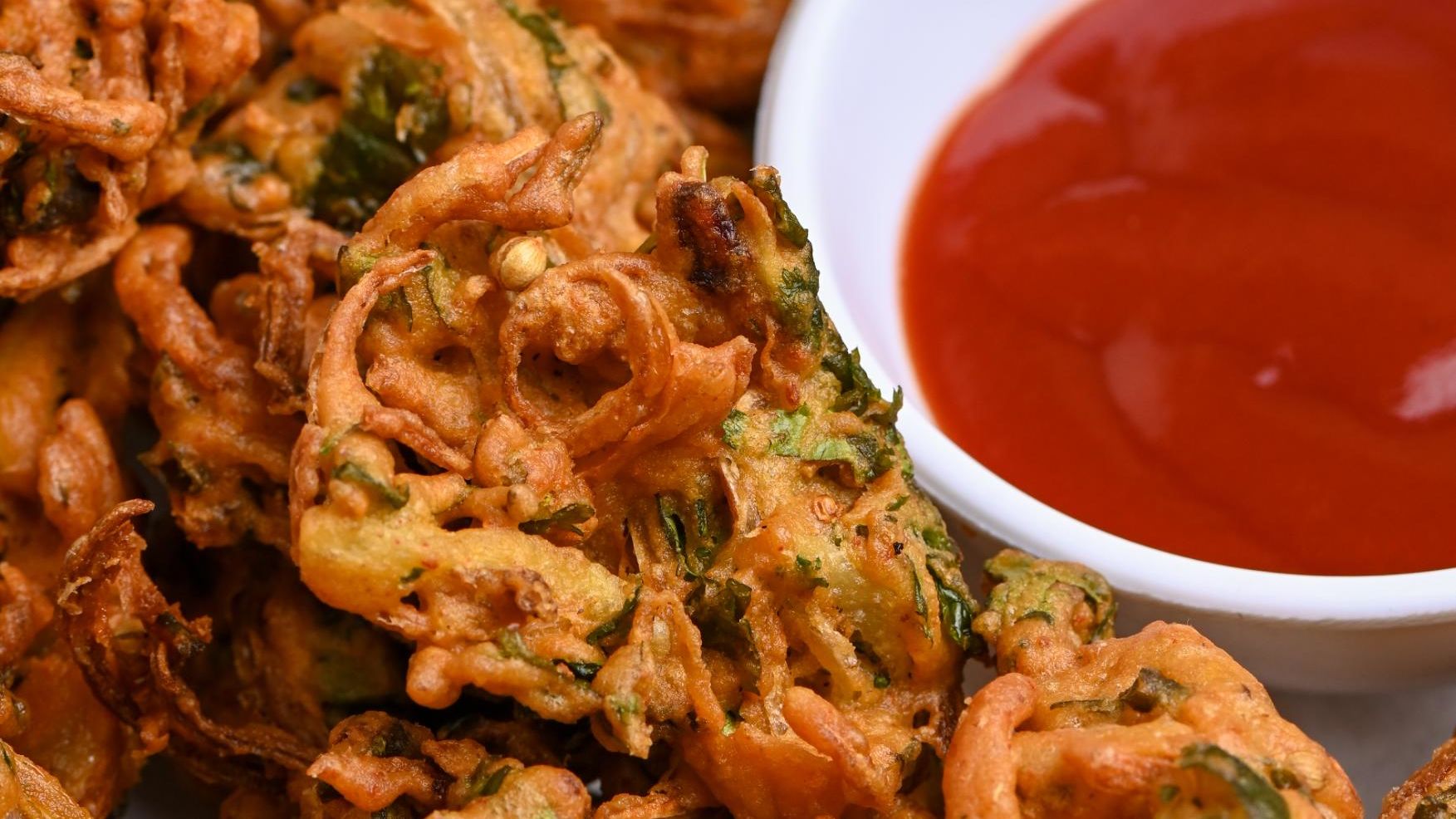 Pakoras are best eaten while still hot.