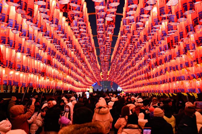 Thousands of lights and lanterns have transformed the massive wall and its towers into a dream-like scene.   