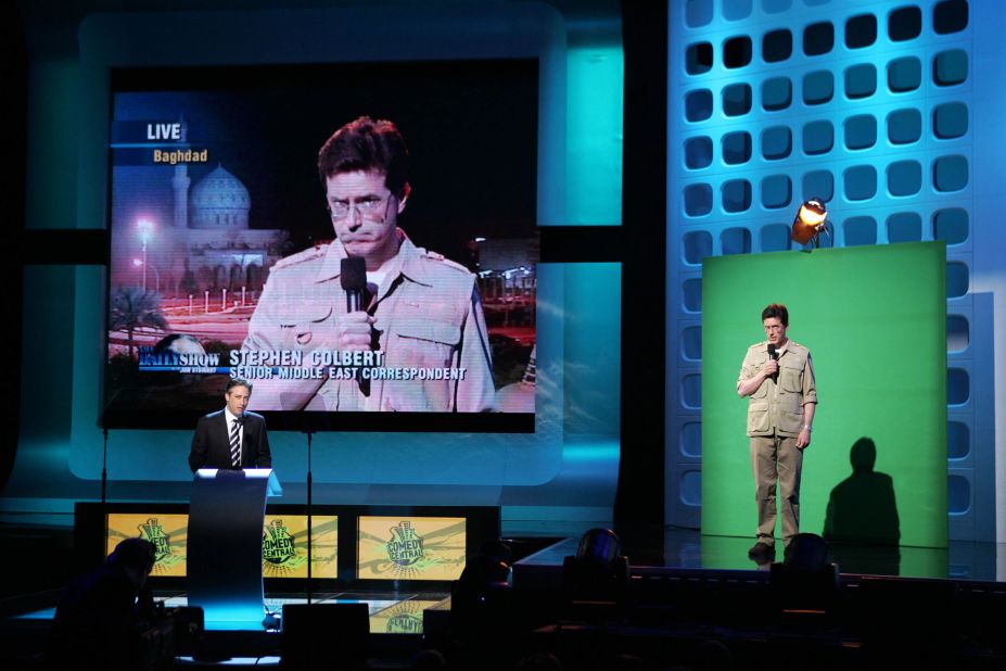 Stewart and Stephen Colbert perform together at an MTV Networks Upfront event in 2005. Colbert was a breakout star on "The Daily Show," playing a correspondent character. He eventually got his own show.