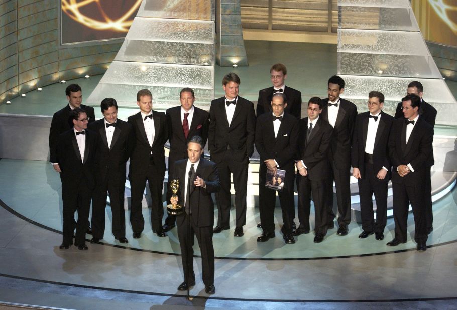 Stewart, along with his "Daily Show" writing staff, accepts an Emmy Award in 2004 for outstanding writing for a variety, music or comedy program.