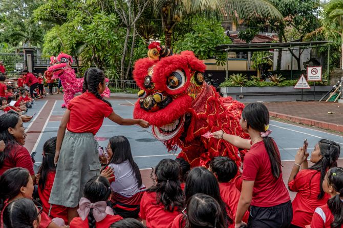 Barongsai Lion Dance entertains students at Widiatmika School in Jimbaran, Indonesia on February 7.