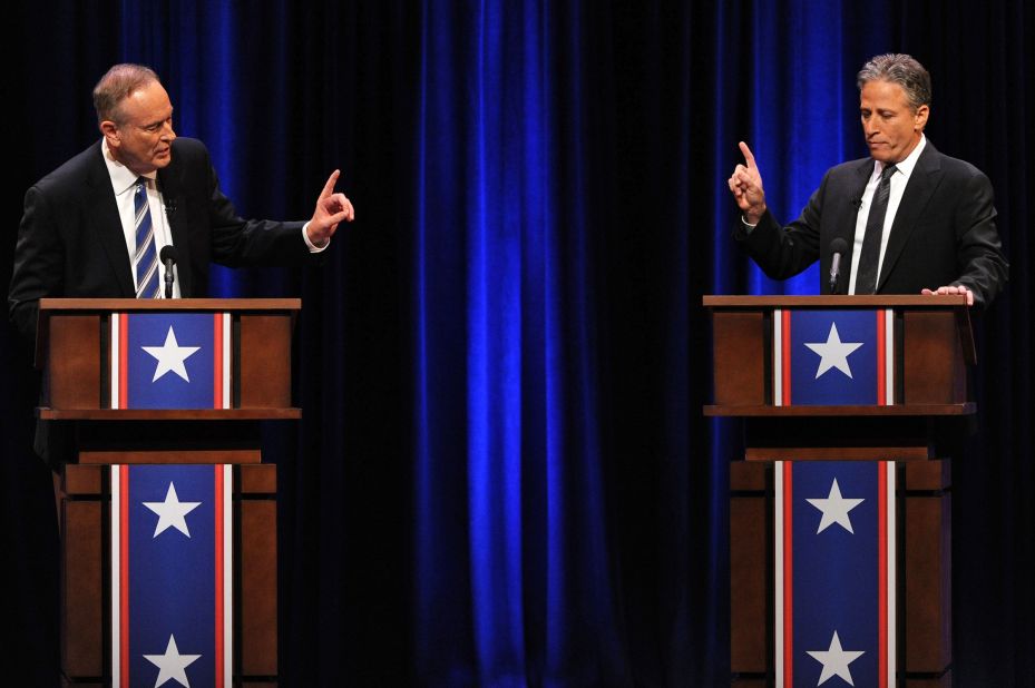 Stewart debates conservative media host Bill O'Reilly in Washington, DC, in 2012. The event was called "The Rumble in the Air-Conditioned Auditorium."