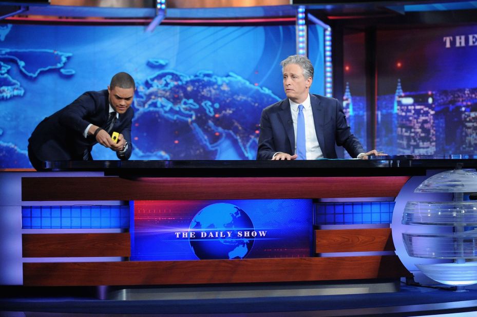 Trevor Noah, left, appears with Stewart on a his last episode of "The Daily Show" in 2015. Noah replaced Stewart as host.